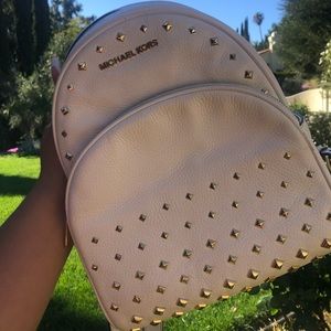 MK white studded backpack